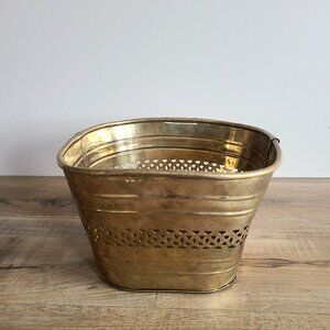 Vintage brass planter/cover pot with cutouts design.